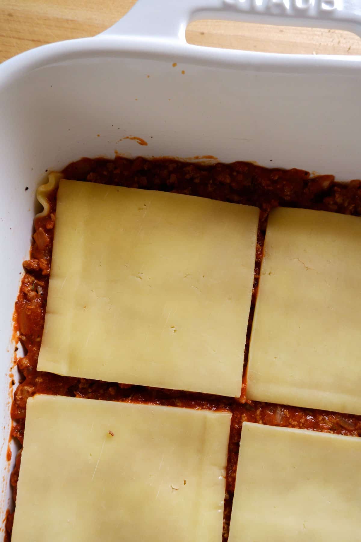 lasagna meat sauce layered with mozzarella cheese